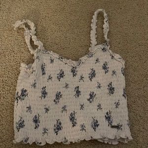 Hollister floral tight and cropped tank top.